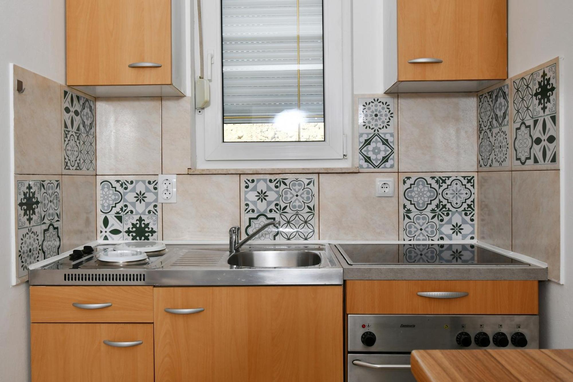 Apartments Novotny Banjol Exterior photo